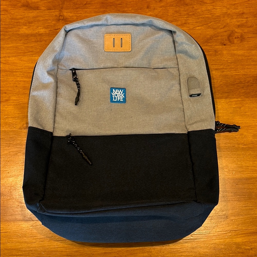 NEW YORK LIFE Gray and Navy Travel Backpack Laptop Sleeve Charging Port & Cable